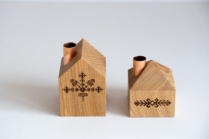 Oak house candle holders with Latvian symbols